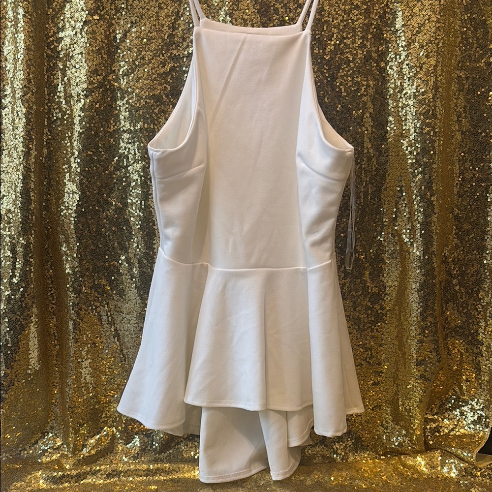 White Sleeveless Flared peplum blouse